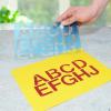 imageWestcott LetterCraft Stencil Helvetica Font 2Inch Characters 15841Helvetica Font